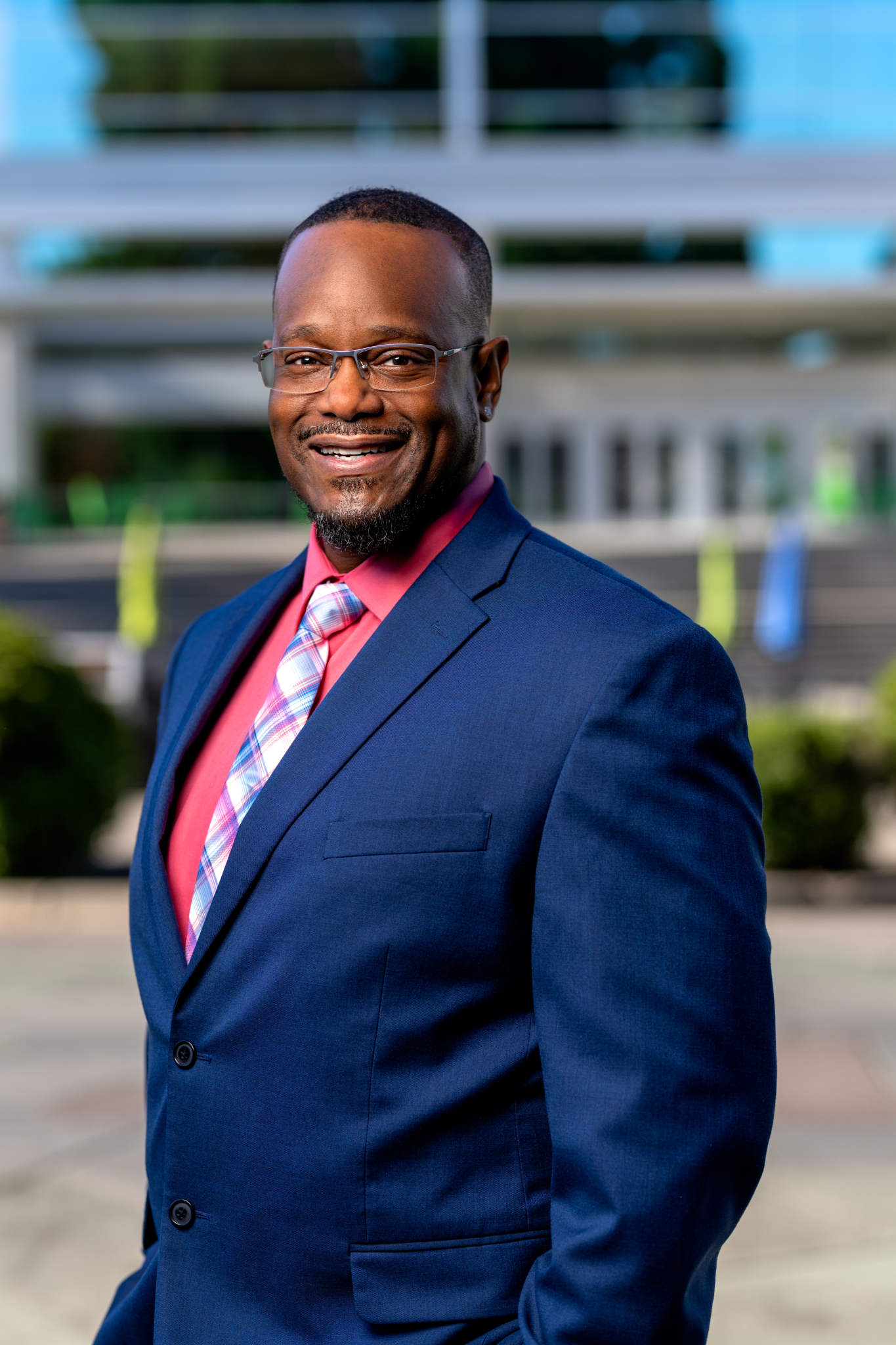 Titonian Wallace Sr., Founder of the Black Advisory Business Council Scholarship Fund for minority students in Hillsboro, Oregon, smiling in a professional outdoor portrait.